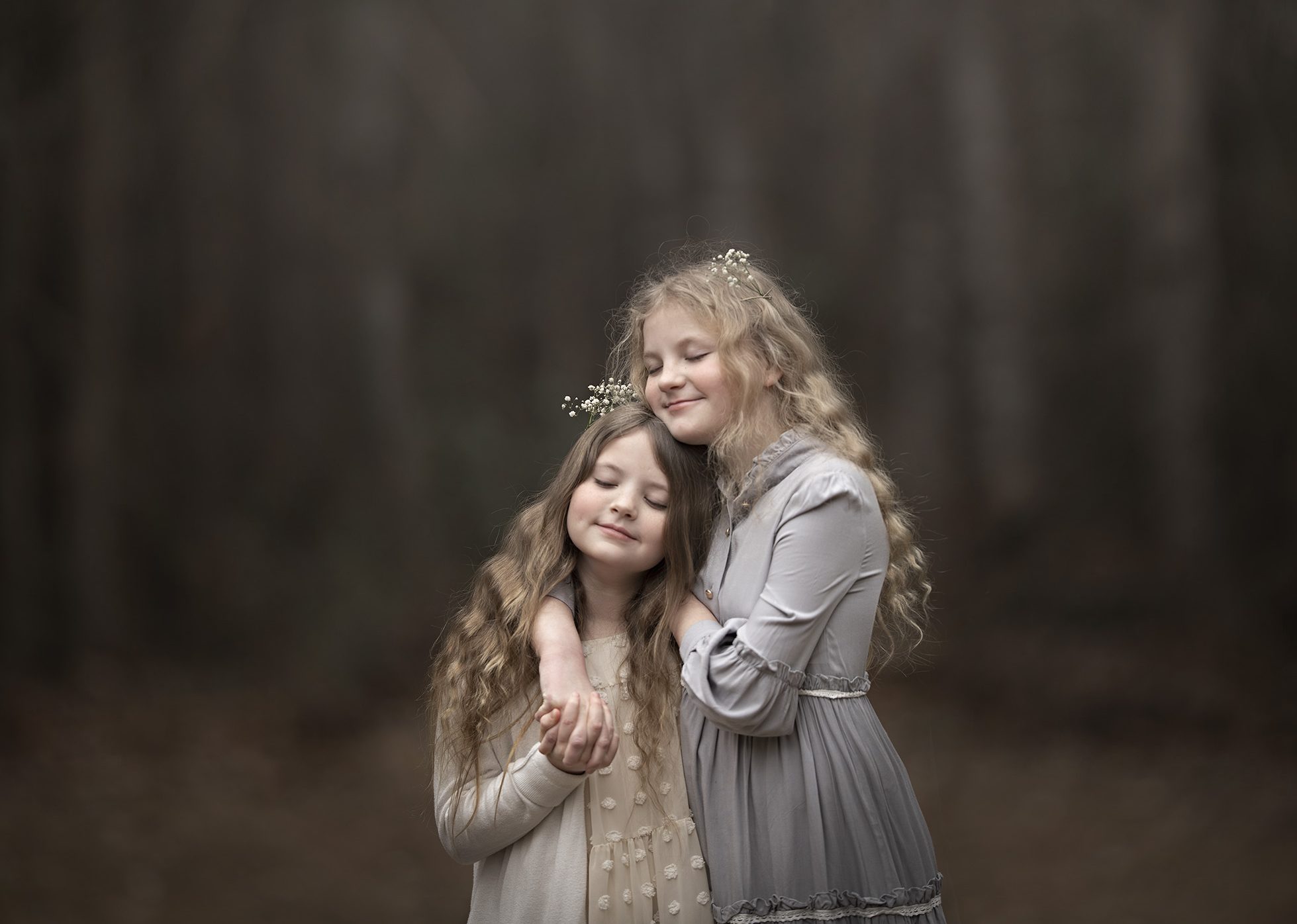 Valentines Day Photography. Sisters hugging.